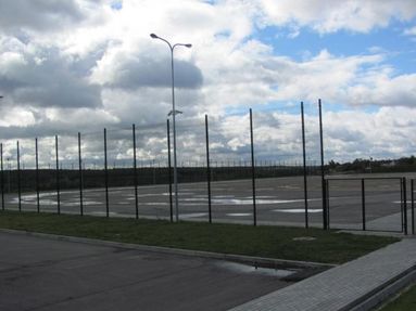 Stadiums, sports grounds, tennis courts fencing